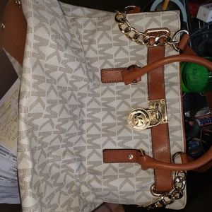 MC pocketbook ,Tomtom and Victoria secrets bag